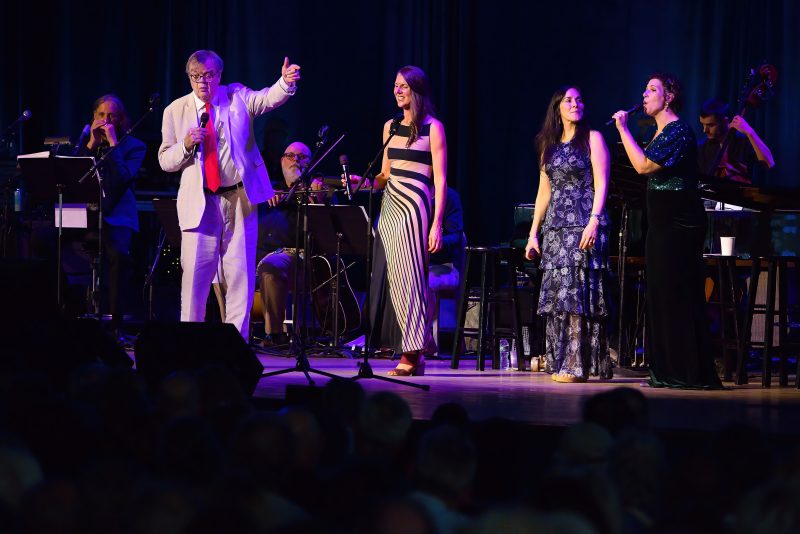 Garrison Keillor with Heather Masse, Christine DiGallonardo, and Ellie Dehn; Hilary Scott photo.
